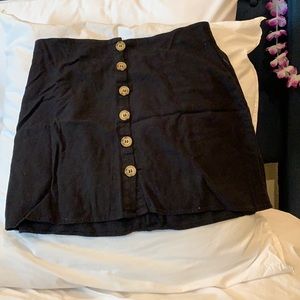 Black buttoned mini skirt